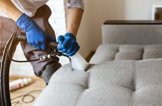 Soft furnishings being vacuumed in a childcare setting